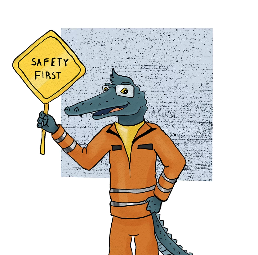 Gary holding a Safety sign to introduce an article about Safety Plans